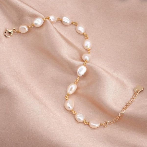 Auréline — Pearls in Golden Motion