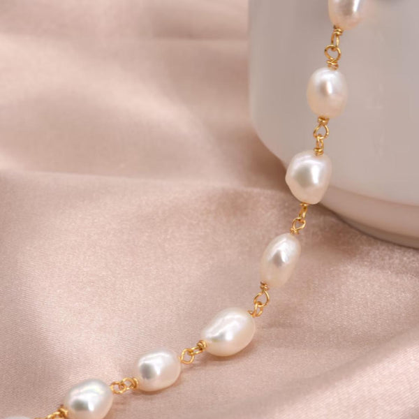 Auréline — Pearls in Golden Motion