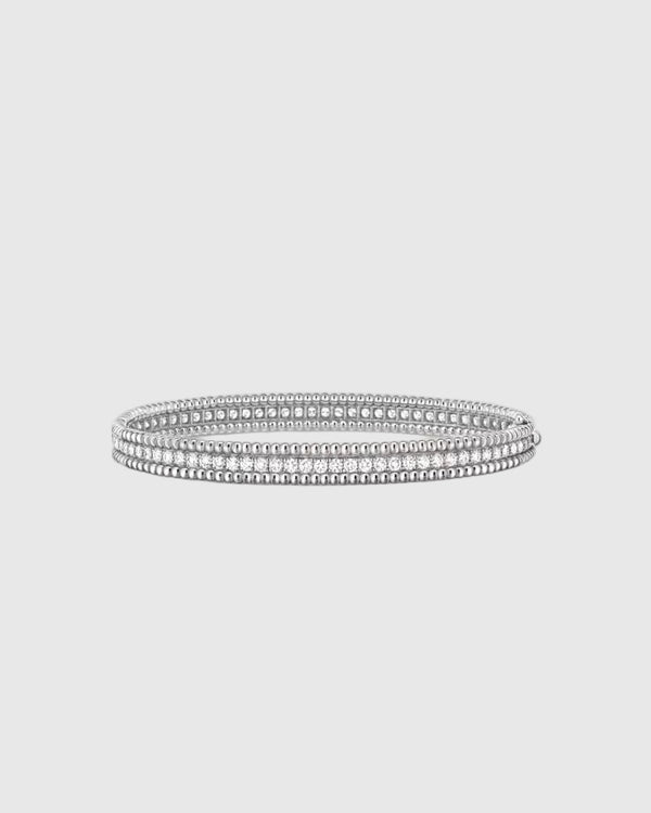 Flat front view of the premium rhodium-plated 925 sterling silver eternity bangle, demonstrating the seamless 6mm wide profile and explosive diamond-like fire.