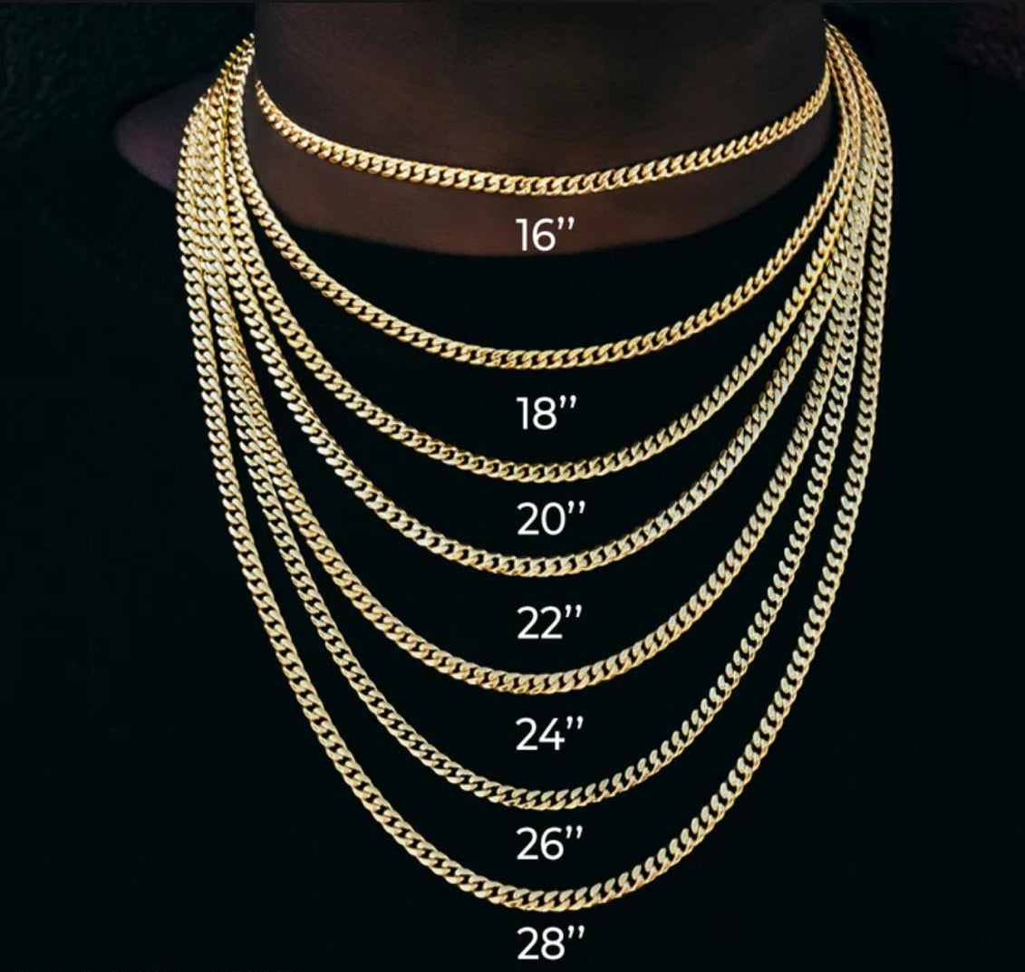 Gold chain necklace displayed on a mannequin with measurements in inches.