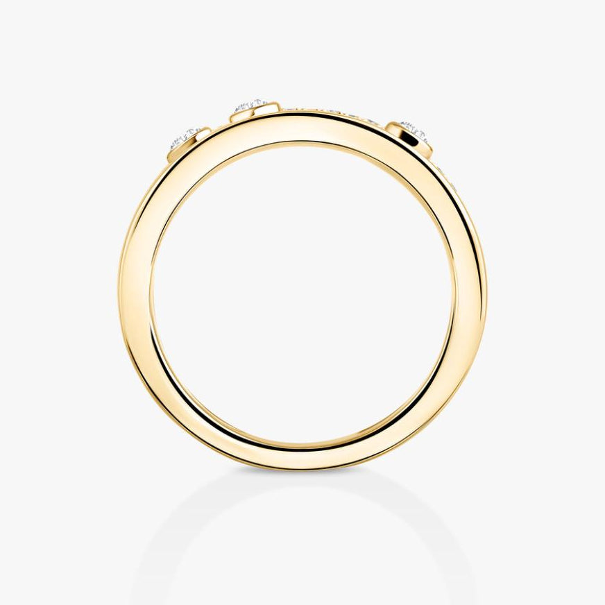 Gold ring with small diamonds on a white background