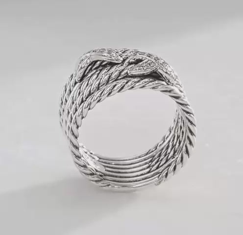video of silver rings with diamond accents on a white background