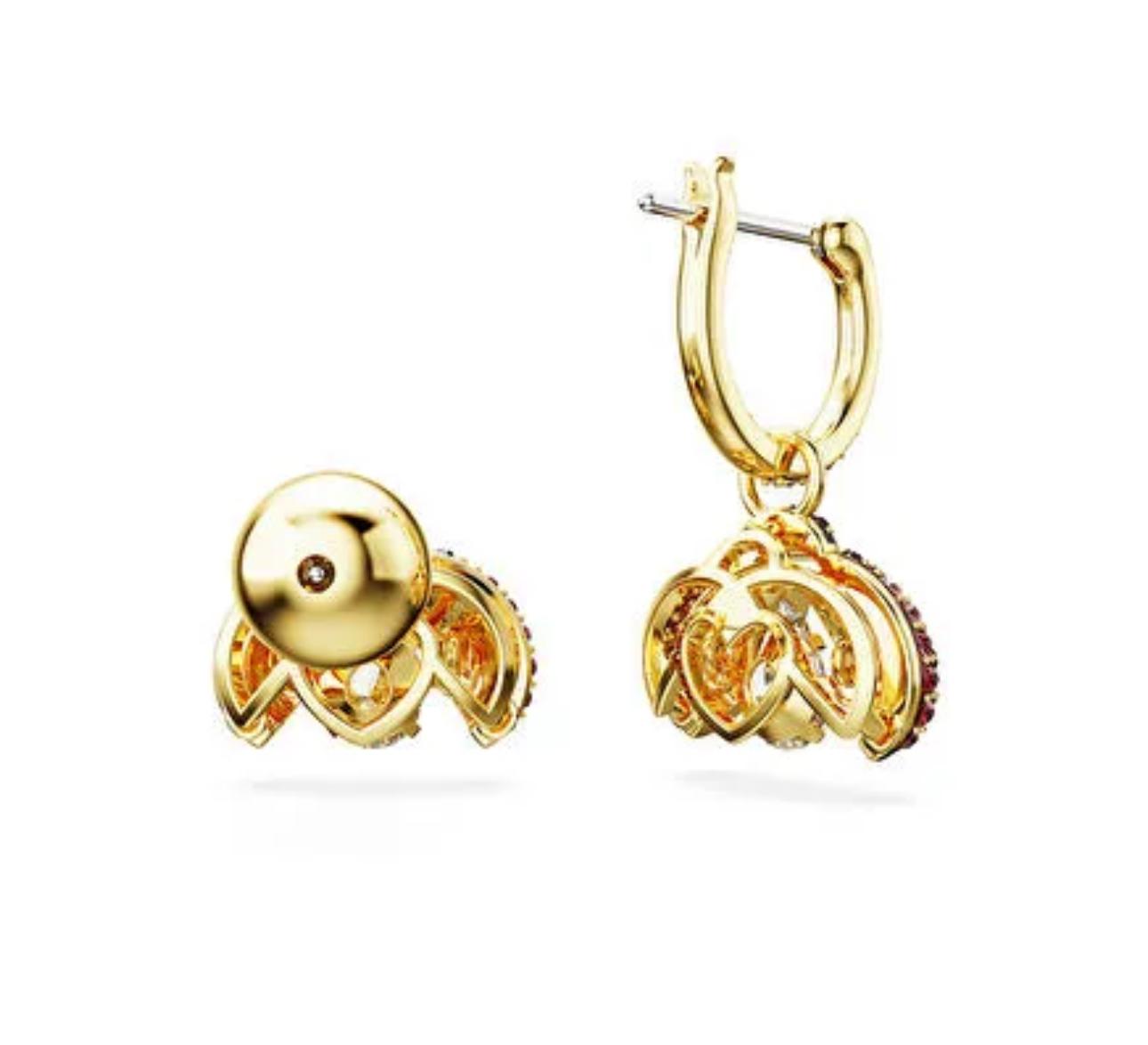 Gold hoop earrings with ladybug motif, featuring a central zircon stone and red and white accents on a gold-tone finish on a white background