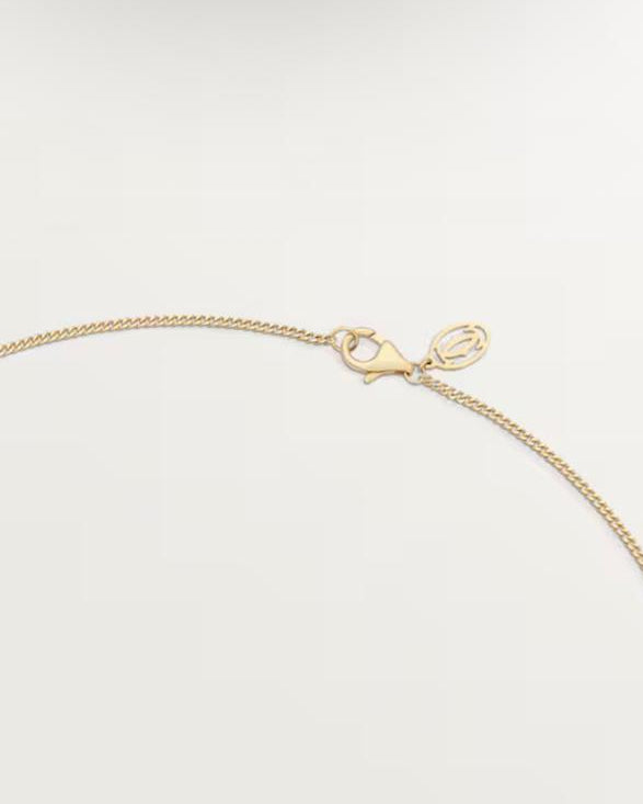 Close-up of a secure gold-plated lobster clasp and extension chain on Veltori jewelry