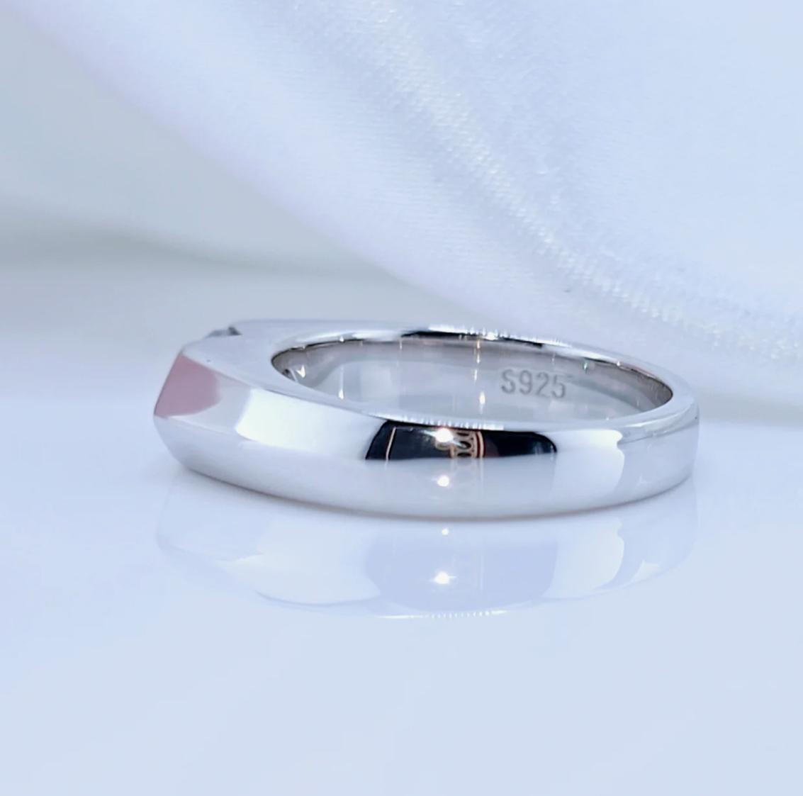 A marquise-cut moissanite ring with a 1ct D-color VVS1 clarity, set in sterling silver and plated in 18K white gold.