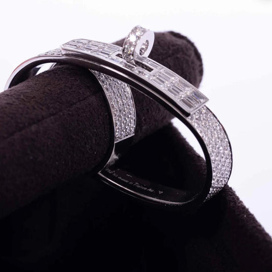 Silver ring with diamond on a black cushion