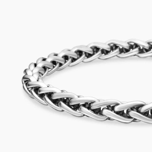 Silver chain bracelet on a white background