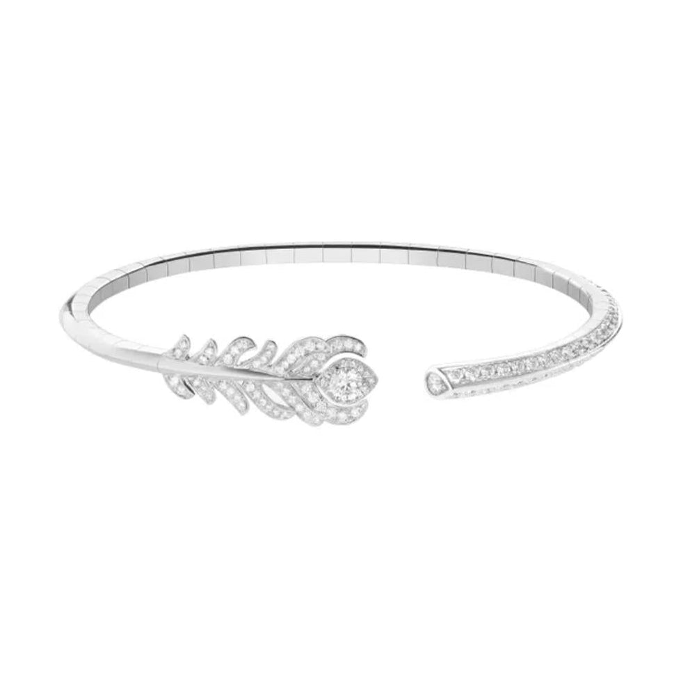 boucheron Silver bracelet with feather design on a white background