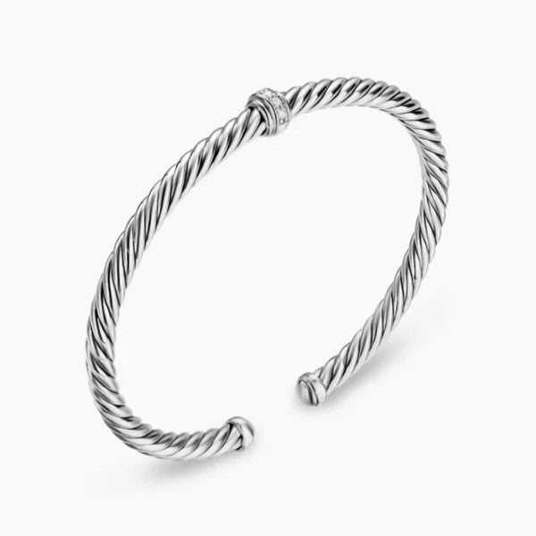 Sterling silver twisted cable cuff bracelet with a central pavé-accented ring.