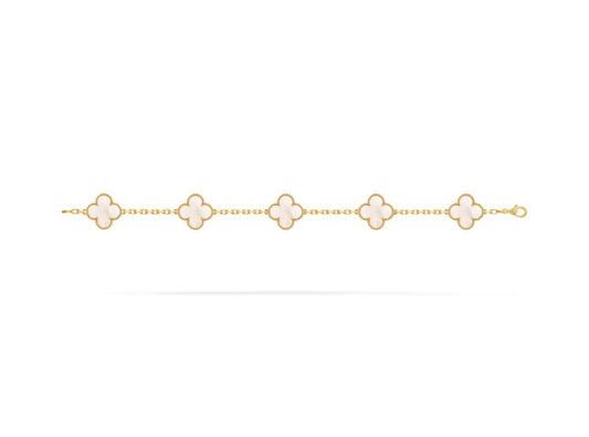 Gold bracelet with four-leaf clover charms on a white background