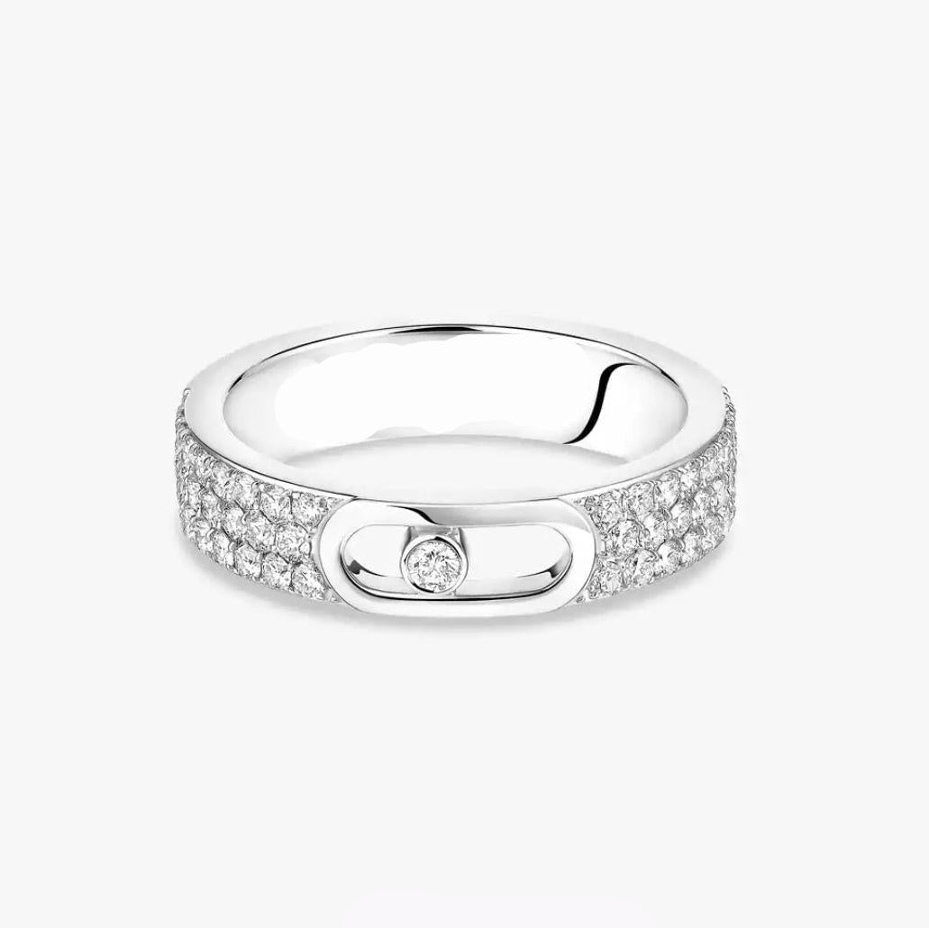 Silver ring with diamond accents on a white background, featuring the Messika brand.