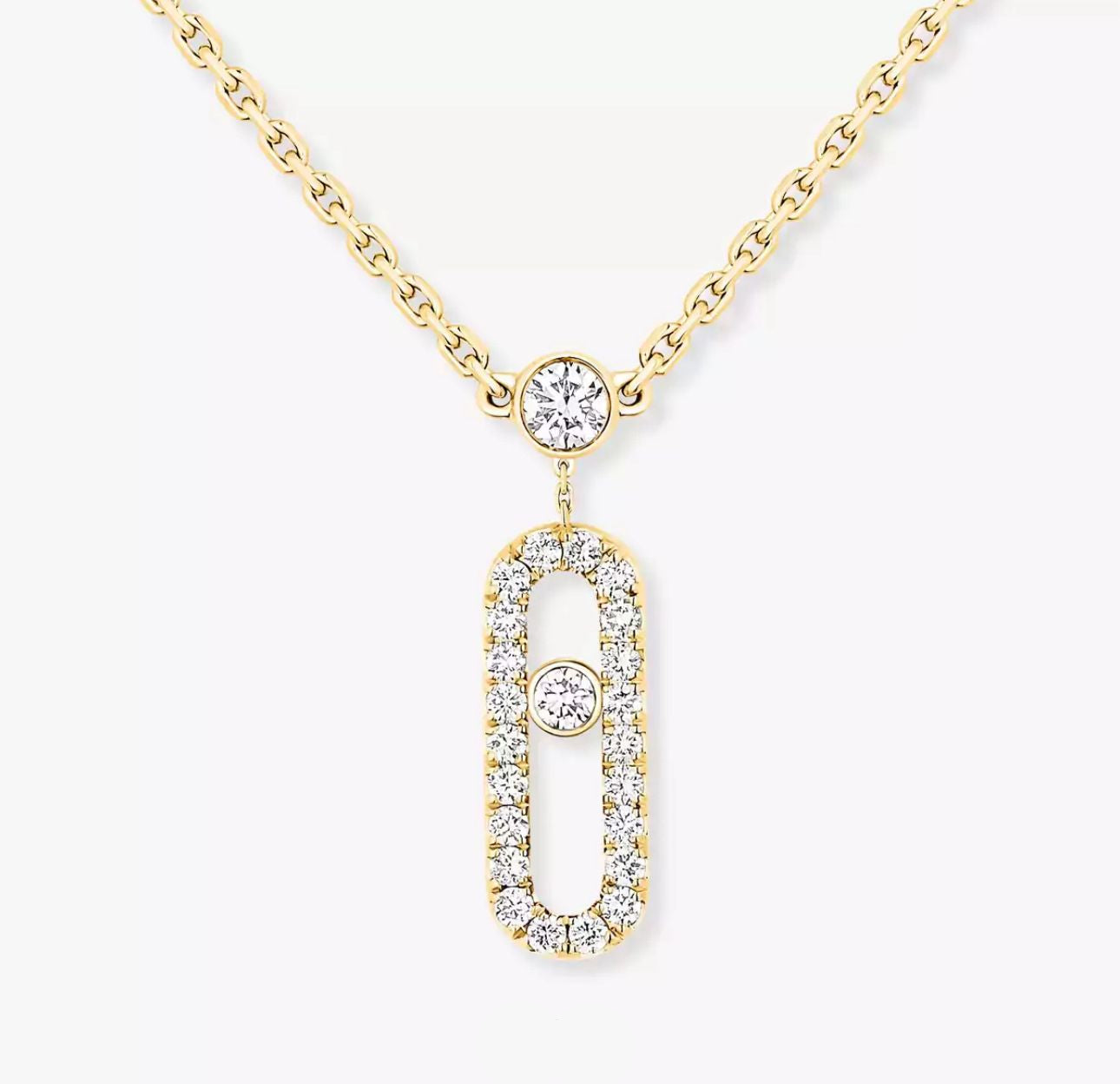 Gold necklace with a diamond pendant on a white background