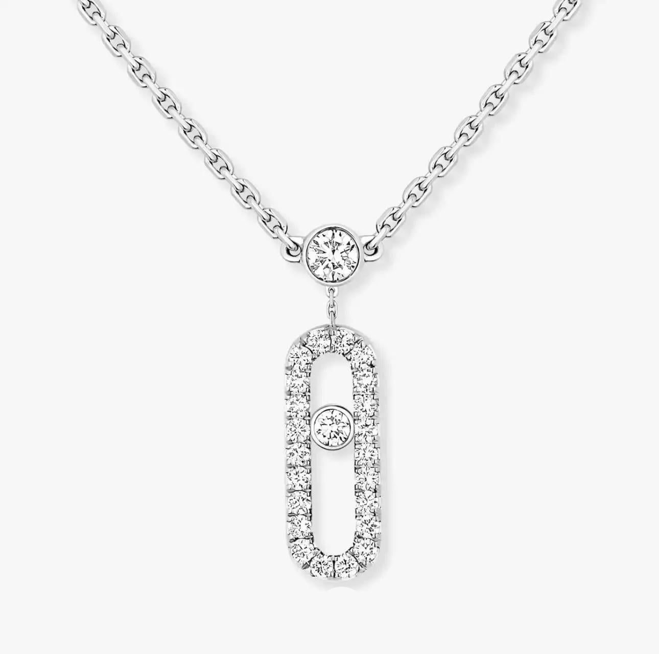 Silver necklace with two diamond pendants on a white background