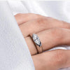 A marquise-cut moissanite ring with a 1ct D-color VVS1 clarity, set in sterling silver and plated in 18K white gold.