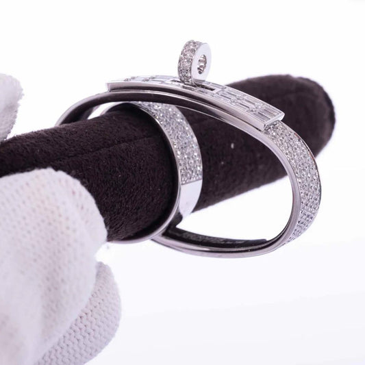Silver ring with diamond on a white background