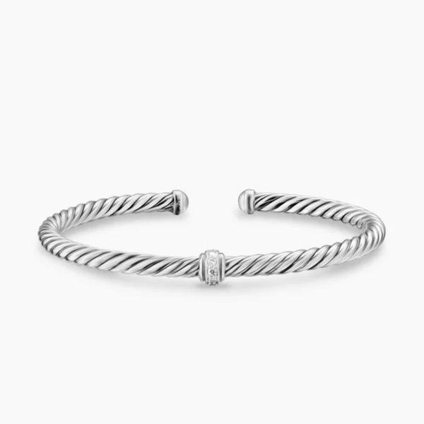 Sterling silver twisted cable cuff bracelet with a central pavé-accented ring.
